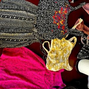 Crop tops all are small except the pink one which is a medium